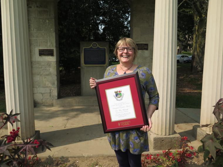 Tina with award